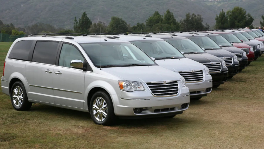 A line of 2008 Chrysler Town and Country minivans Chysler Archives RESIZED 5