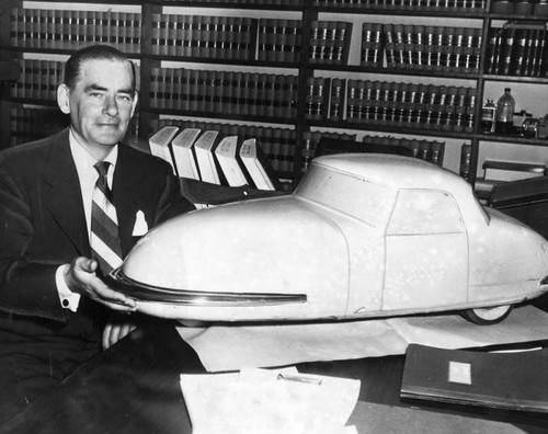 Gary Davis holding a prototype model George ODay 1