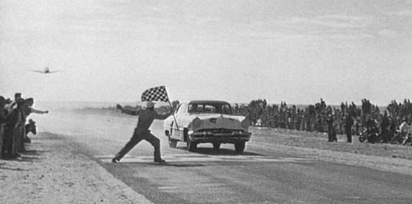 Chuck Stevenson crosses the finish line in 1952 Ferens Collection 4