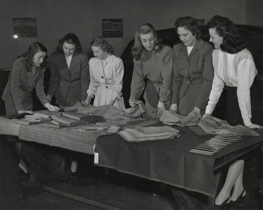 Women examining upholstery at Ford 1950 NAHC RESIZED 3