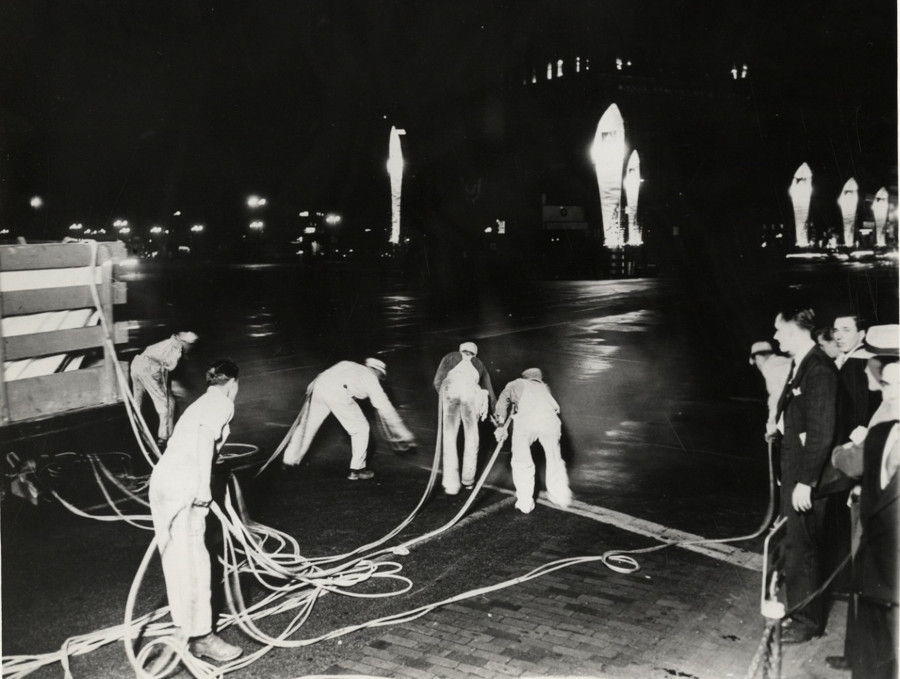 Workers spraying gold paint on Woodward Ave MacGregor CROPPED AND RESIZED 3