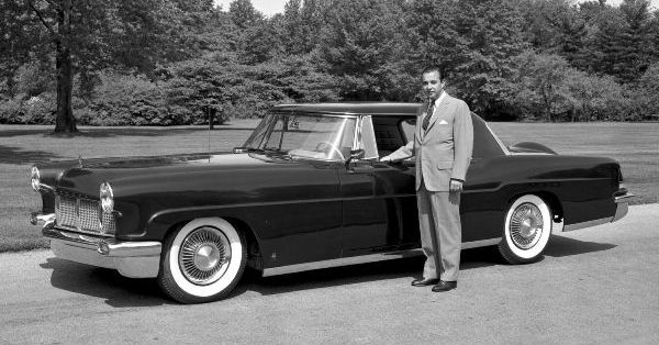 William Clay Ford standing with a 1956 Continental Ford Motor Company Archives 2