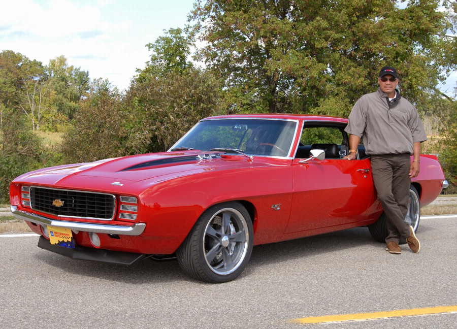 Reggie Jackson poses with his 1969 Chevy Camaro CROPPED and RESIZED