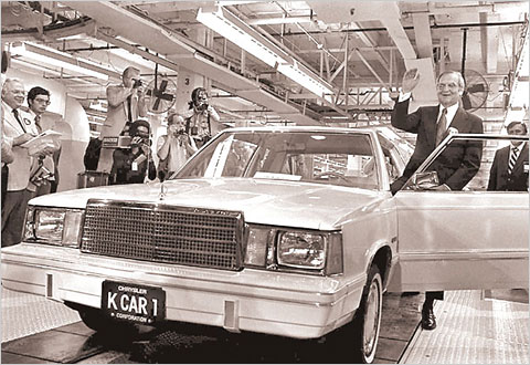 Lee Iacocca with a K Car Stellantis Chrysler Archives 8