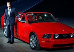 Bill Ford Jr standing with Ford Mustang Ford Media Center 5