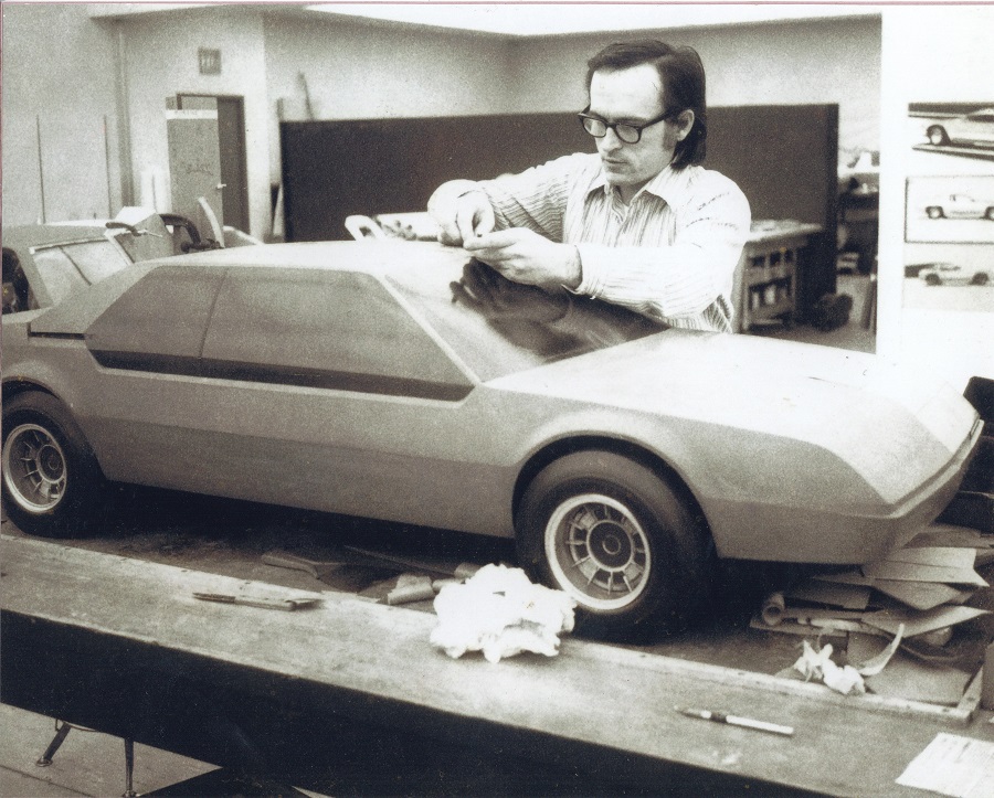 Ronald Konopka with a clay model of a 1975 Chrysler turbine car proposal Konopka Collection