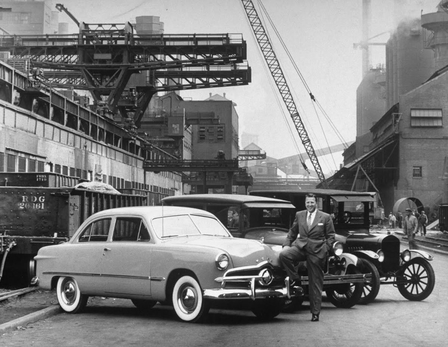 Henry Ford II standing in front of a 1949 Ford RESIZED 2